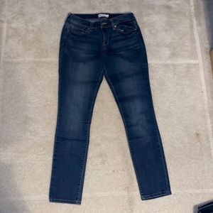 Jessica Simpson skinny stretch, rolled ankle jeans.